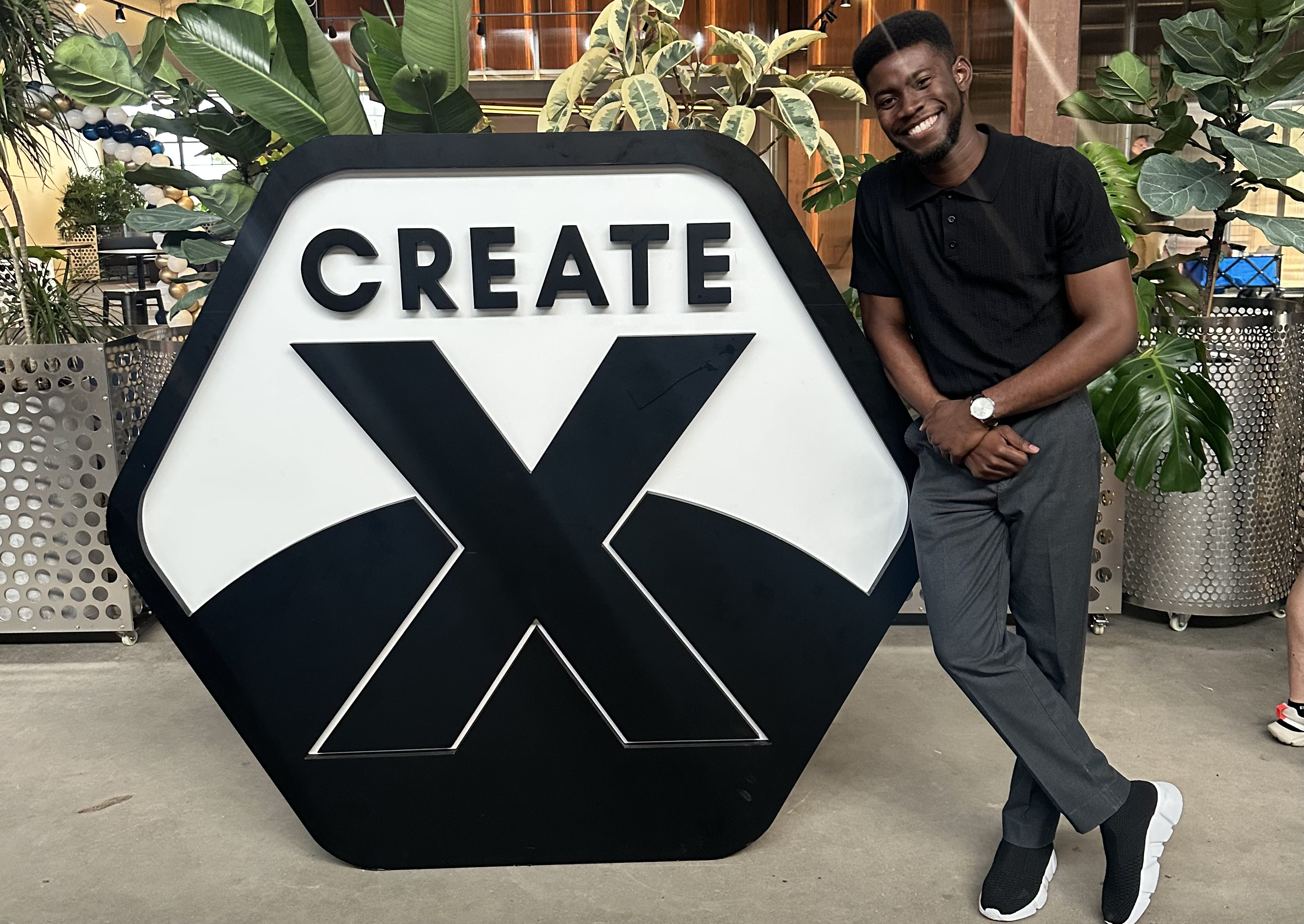 Posing with Create-X Logo after Program Completion